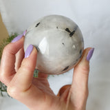 Tourmalinated Quartz Sphere With Stand