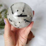 Tourmalinated Quartz Sphere With Stand